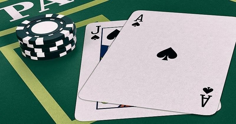 The player wins if their total score is higher than the dealer's but does not exceed 21 points.