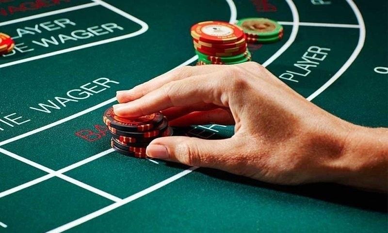 What factors influence the actual probability in Baccarat?